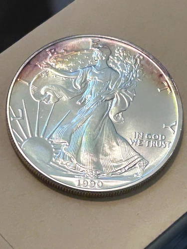 1990 American Silver Eagle 1 TROY Oz .999 Fine Coin with Toning #62