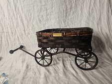 vintage or antique wicker doll carriage