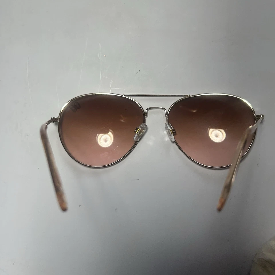 Gafas de sol con licencia de aviador Disney lentes rosas diseño de arco marco de metal mercancía de Disney Foto 3 de 4