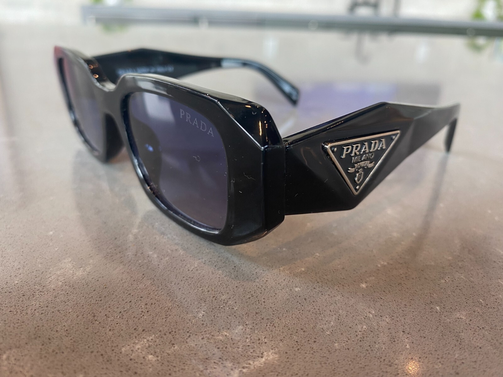 Prada Black Frame Sunglasses with Stylish Design and UV Protection