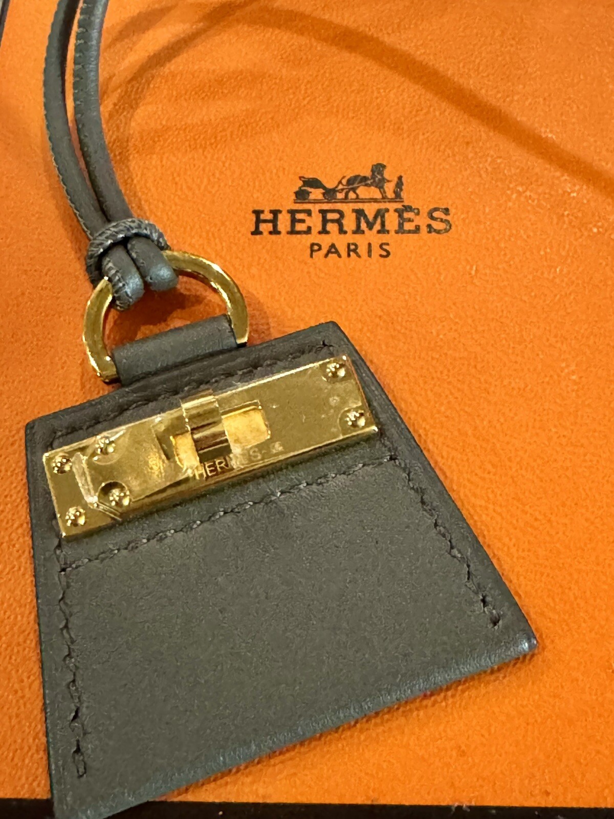 Hermes Kelly Turnlock Pendant Necklace Black Leather, Gold HardwareAuthentic Box
