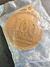 Delta Airlines Brass Key Ring, commemorative of over 100 Million customers-NEW