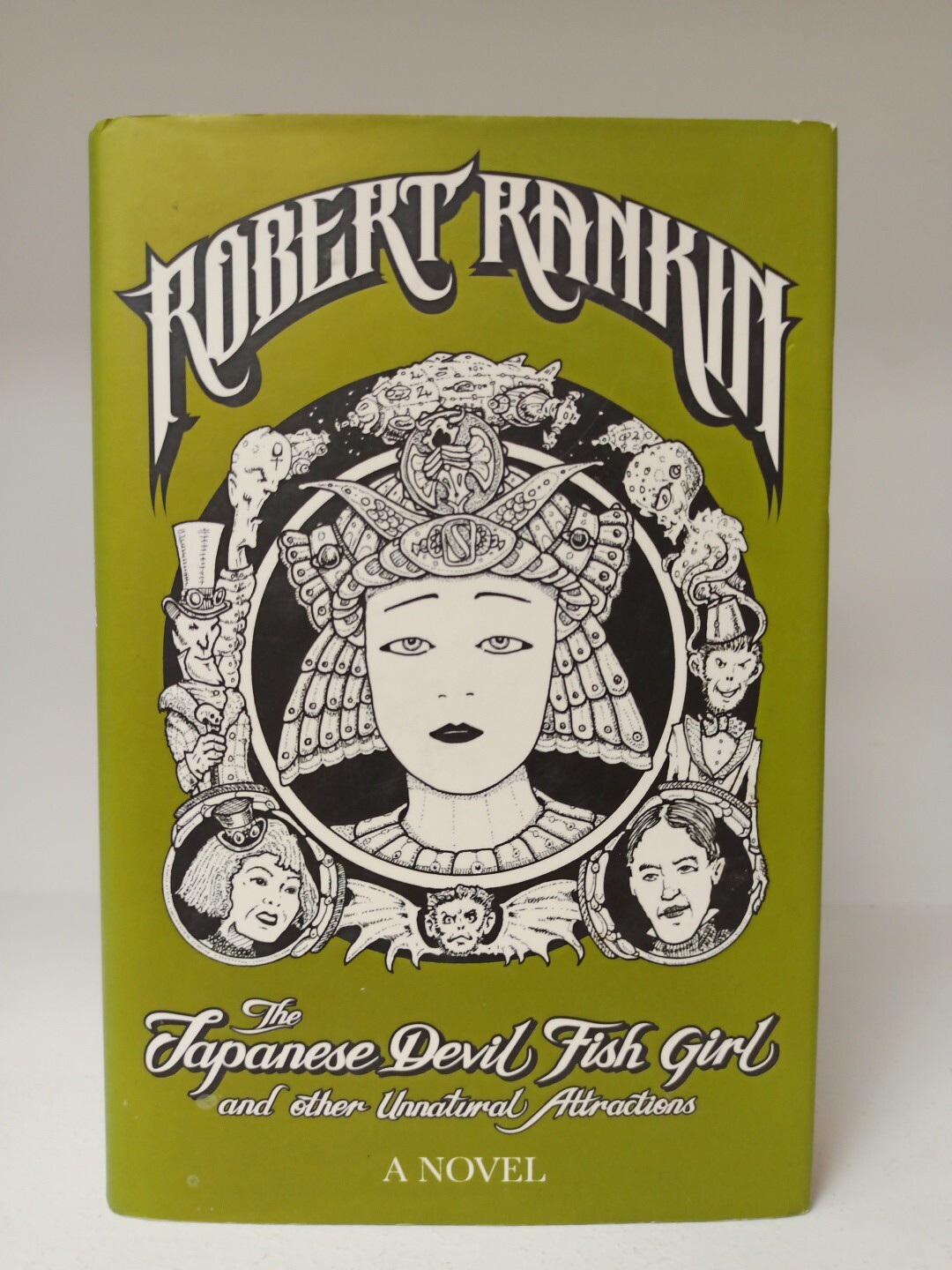 The Japanese Devil Fish Girl and Other Unnatural Attractions by Robert Rankin...