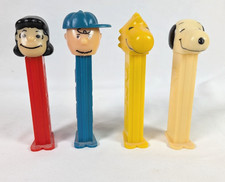 4 Vintage Peanuts PEZ Dispensers Charlie Brown Lucy Snoopy Woodstock