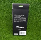 Black Sig Sauer box with white text, “GENUINE PARTS + ACCESSORIES” and logo, on green grass background.