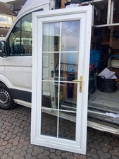 Used White UPVC Front Door and Frame with gold handle, clear glazing - No key