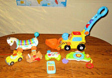 USED TOY LOT OF 7: Daniel Tiger; Dashboard; Phone; Bulldozer; Alpha Pup; Sounds