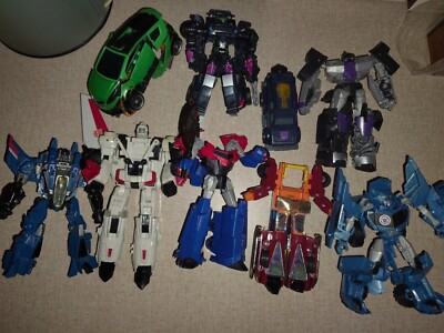 Transformers action figure Lot of 9.