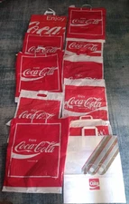 Lot of 11 Coca Cola plastic and paper bags all different sizes