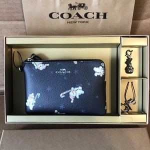coach wristlet with charms