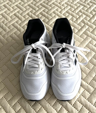 Adidas Duramo 10 running shoe size 12K for kids. White Color with Black Stripes