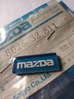 Mazda 808 / 818 / Rx3 - Steering Wheel Badge / Logo / Emblem, Genuine New