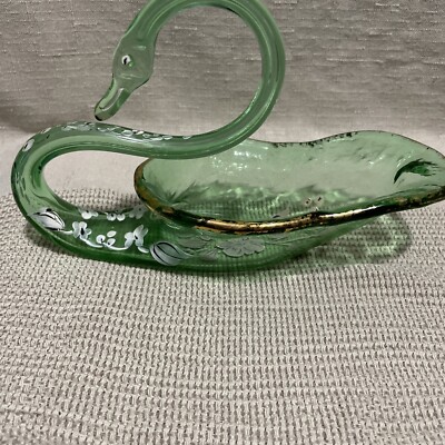 GREEN HANDBLOWN GLASS SWAN WITH GOLD LEAFING &HANDPAINTED FLOWERS.
