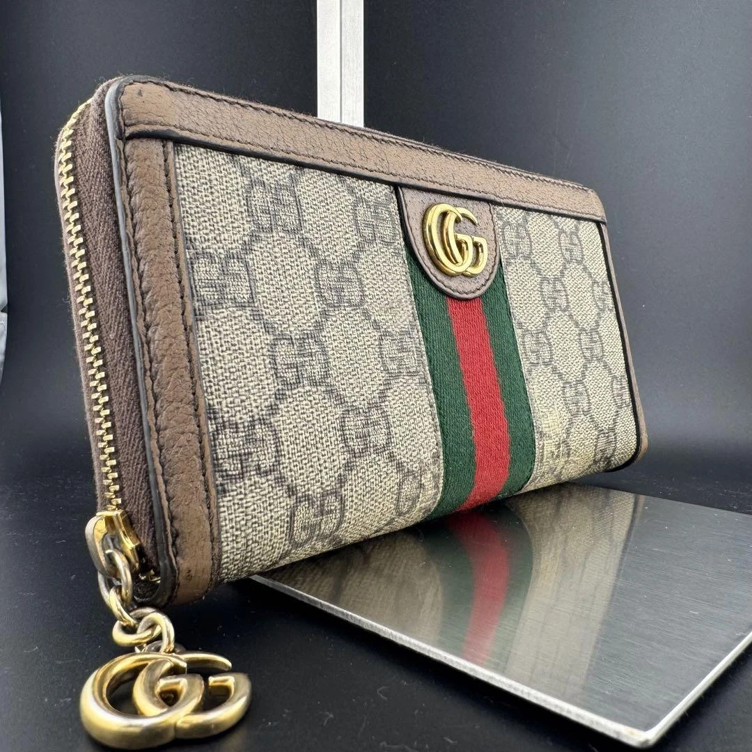 Authentique portefeuille Gucci couleur marron V10 cm L19 cm Marmont Sherry Line GG Supreme