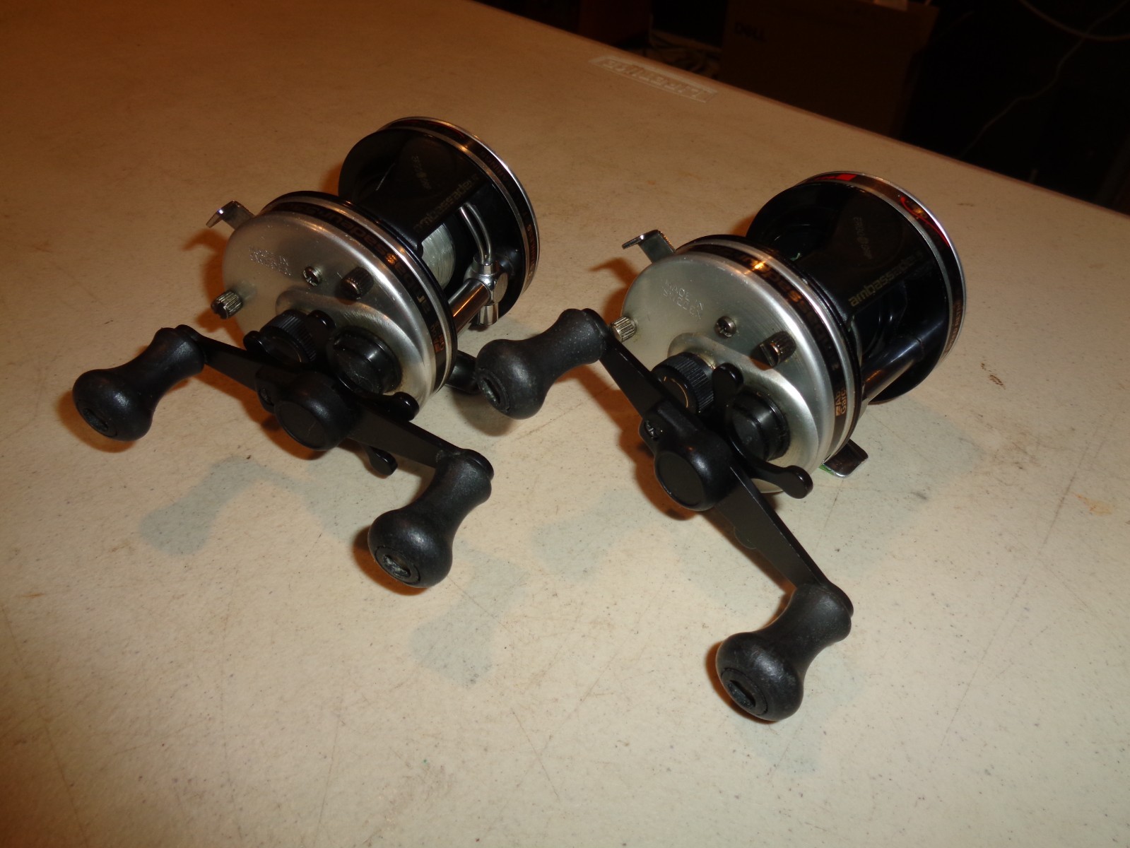 2 Abu Garcia Ambassadeur 5500C3 Baitcasting Reels, right han