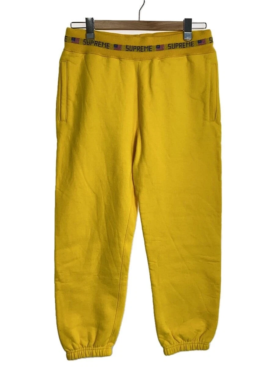 Pantalon sweat côtelé logo suprême jaune occasion