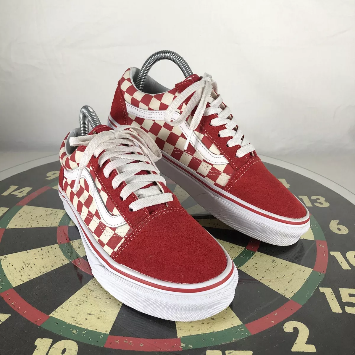 Old skool red shop and black checkerboard vans