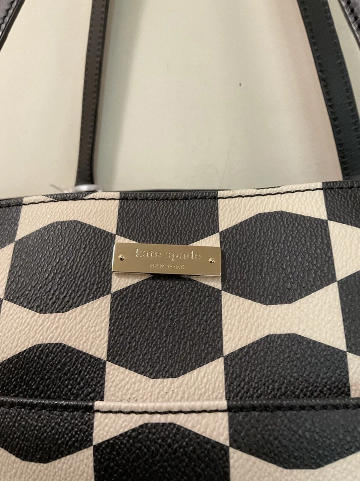 Bolso de bebé Kate Spade New York Bow Tile Francis negro arena playa Foto 3 de 4