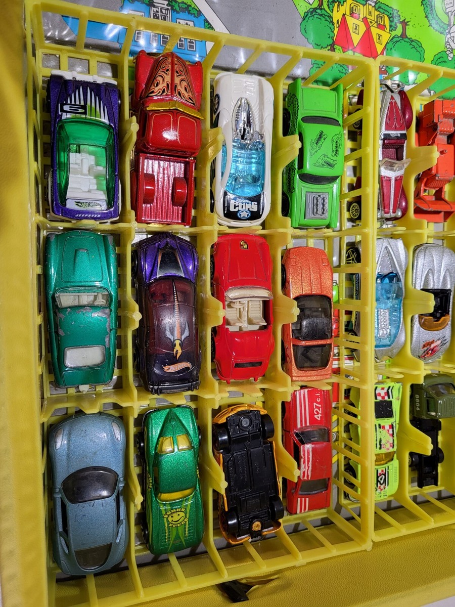 Sold at Auction: A Matchbox Series Collector's Case containing 48 Matchbox 1-75 Series diecasts