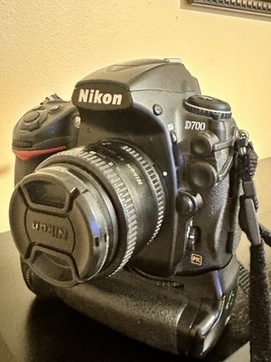 Nikon D700  w/MBD10 grip + 2 Lenses/3 Nikon Batteries  & Lowepro backpack