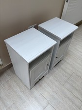 Set Of Two IKEA Aspelund White Painted Bedside Tables With Door And Two Shelves