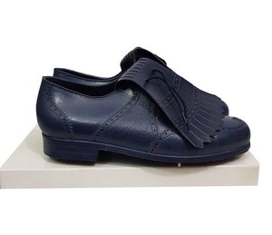 golf shoes at driving range