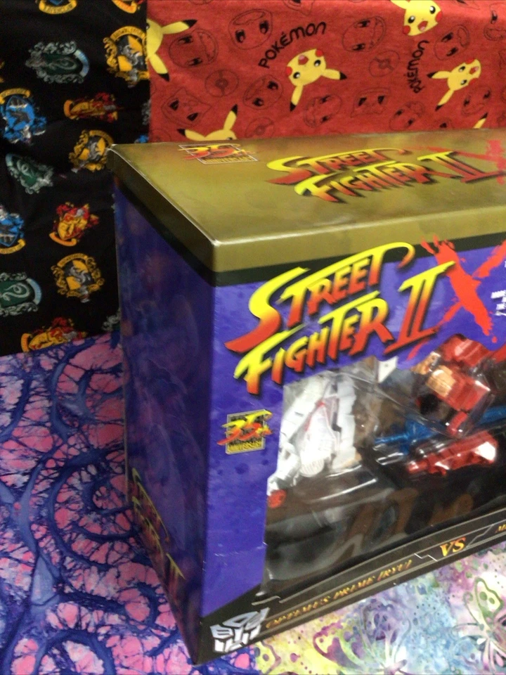 TRANSFORMERS X STREET FIGHTER II OPTIMUS PRIME RYU VS. MEGATRON M. BISON TAKARA Foto 4 de 4