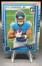 2025 Panini Donruss Optic Elic Ayomanor #235 Rated Rookie Holo Prizm Titans