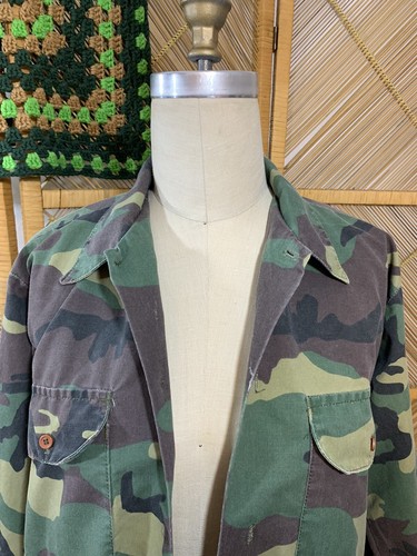 Vintage 1980s USA-made camouflage ranger shirt with green and brown forest pattern and two front flap chest pockets.