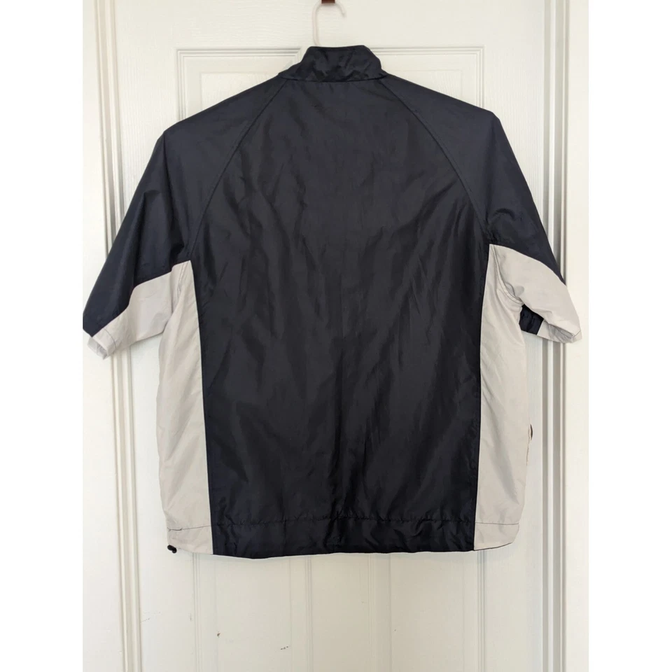 Chaqueta cortavientos Orlimar Golf XL blanca azul marino manga corta 1/4 cremallera para hombre Foto 2 de 4