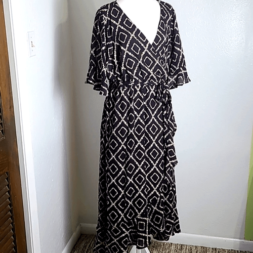 Vestido negro torrido alto-bajo envolvente blanco y naranja diseños florales, talla 1, 1X, nuevo con etiquetas - Imagen 2 de 13