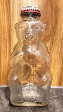 Vintage 1950s BEAR COIN BANK BOTTLE Snow Crest Beverages w/ Lid Clear Glass 7”