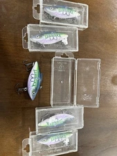 Five Bill Lewis rattle trap fishing lure with lure lock advertising