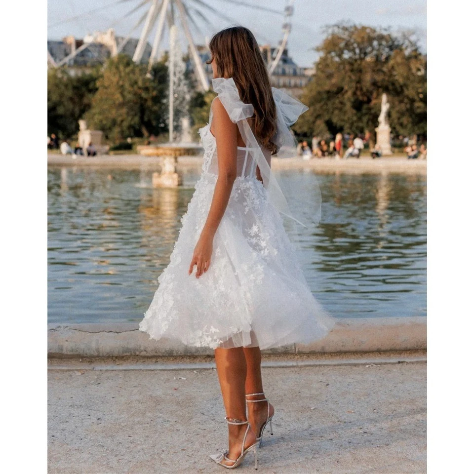 Vestidos de novia románticos con apliques florales 3D boho hasta el té línea A Foto 3 de 4