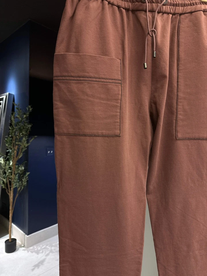 $890 Pantalones Brunello Cucinelli Mujer Granate Con Diseño de Bolsillo Contorno Foto 2 de 4