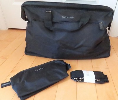 NWOT CALVIN KLEIN Black Duffel Bag w Front Pocket & Pocketbook 22 x 13 Inches