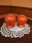 Fiestaware Persimmon Salt and Pepper Shakers Homer Laughlin Round Bulb Style