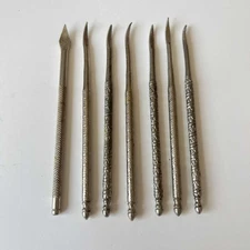 SET OF 7 VINTAGE NUT CRACKER TOOLS - NUT CRACKER PICS TEXTURED HANDLE DESIGN