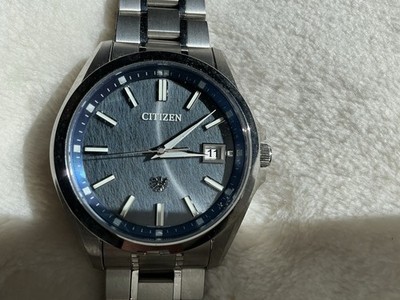 The Citizen titanium eco-drive solar analog 10atm men's watch AQ4091-56M