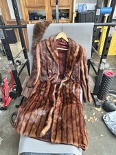vintage Mink brown fur coat and a matching scarf or collar piece.