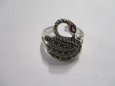 Sterling silver swan style ring adjustable from sizes 5 to 8  open back