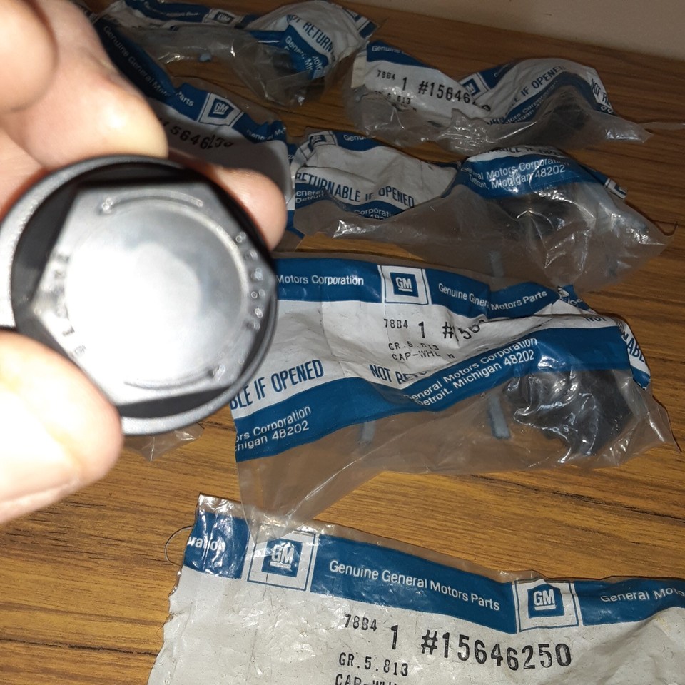 (9) NOS GM Wheel Lug Nut Insert Cover Caps GMC C1500 K1500 1500 Sierra