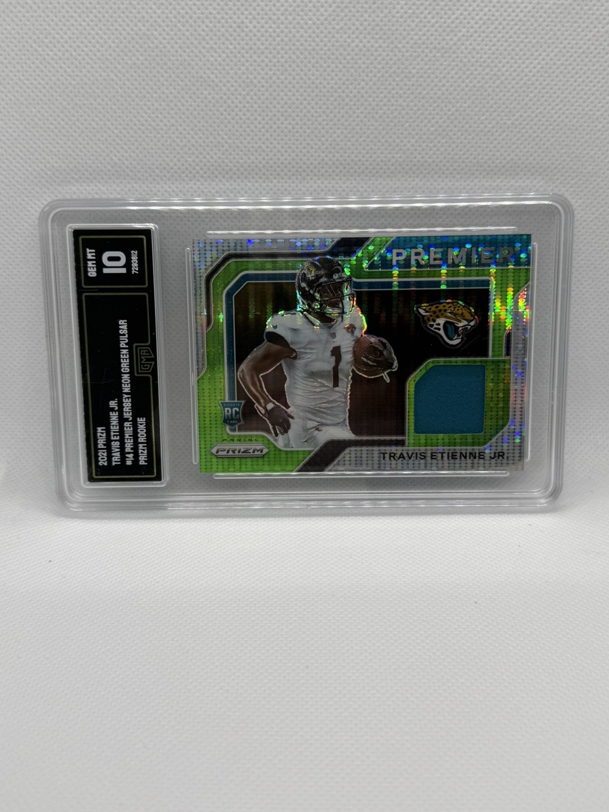 2021 Prizm Premier Jerseys Neon Green Pulsar PSA 8 #PJ-14 Travis Etienne Jr RC