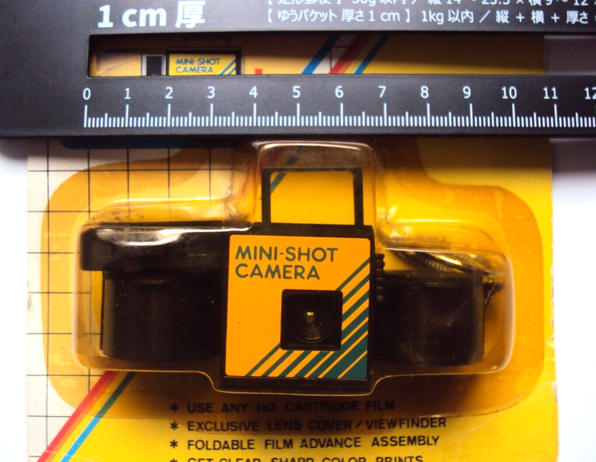 110 Camera Mini-Shot with key chain and coin holder Film Camera