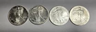 Four  American Silver Eagle coins: 1989, 1990, 2001, 2004  0.999 fine