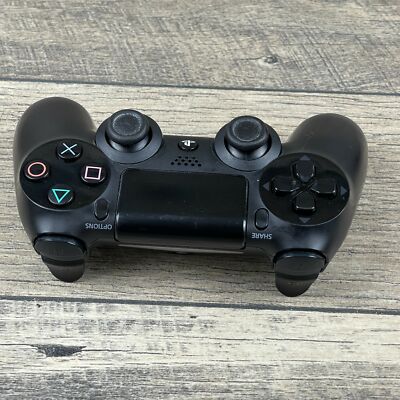 Sony PlayStation DualShock 4 Gaming Controller Please see Picture