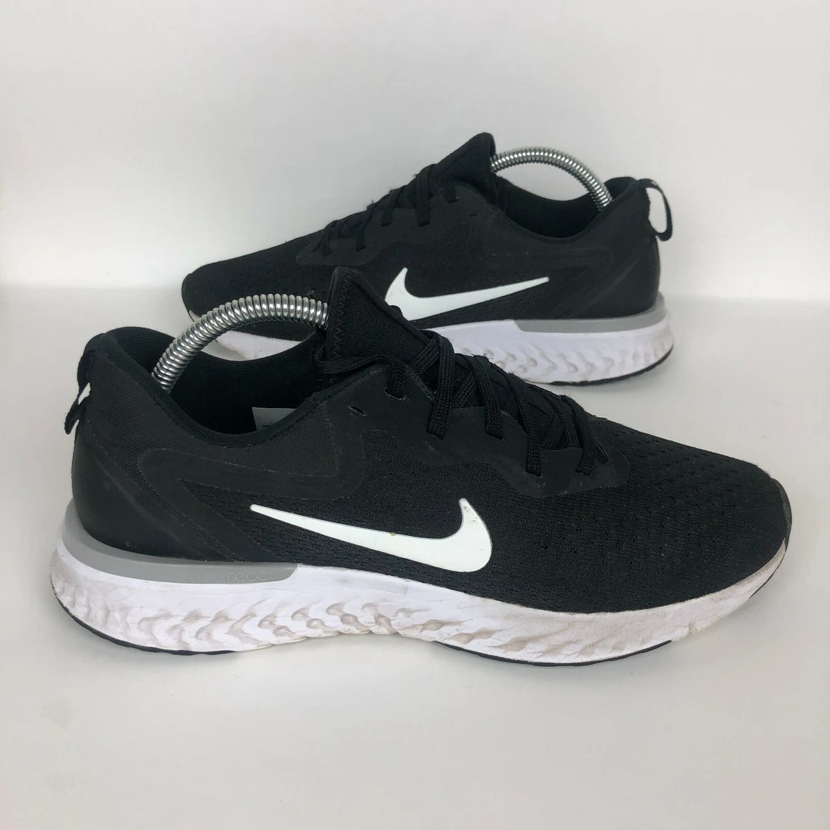 Nike odyssey react store women's black and white