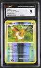 CGC 9 Eevee 59/111 Reverse Holo Rising Rivals Pokémon Card