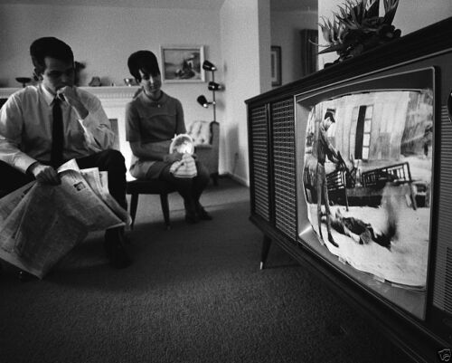 Family watches television news coverage about Vietnam War 1968 - New 8x10 Photo