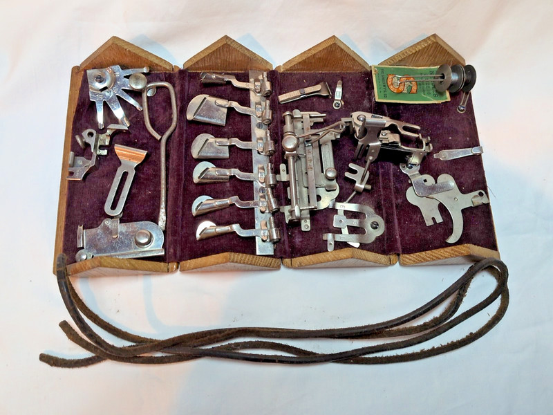 Singer 15 Sewing Machine Oak Puzzle Box w/ many attachments, belt, ruffler